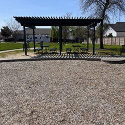 Quail Run Park - The pavilion with two patio benches