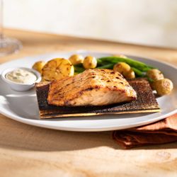 Seasons 52 - Cedar Plank-roasted Salmon with seasonal vegetables, marble potatoes and dill-mustard sauce