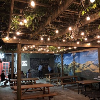 Acme Burger - Outdoor space with a Ivy covered pergola, and cute lights - Burgers Near Me - Cotati, California Acme Burger - Outdoor space with a Ivy covered pergola, and cute lights - Burgers Near Me - Cotati, California