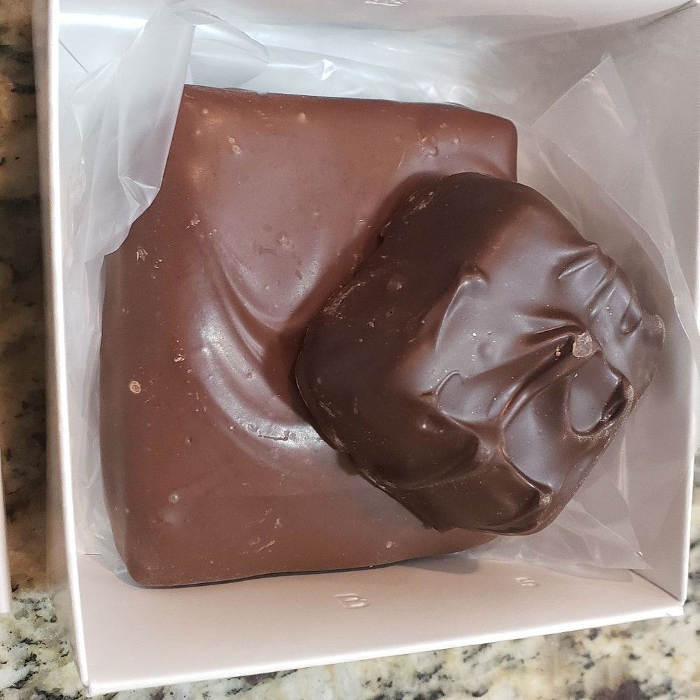 Henry's Sweet Retreat - Milk chocolate s'mores (bottom) and dark chocolate-covered marshmallow (top) - Candy Stores Near Me - Bethesda, Maryland