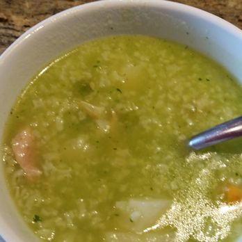 El Pollo Inka - I really enjoyed this green soup...it does have chicken bits in it, so not vegetarian...plus it's even tastier with a squirt of green sauce. - Peruvian Near Me - Lawndale, California