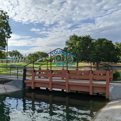 Young Park - Little bridge over the pond.