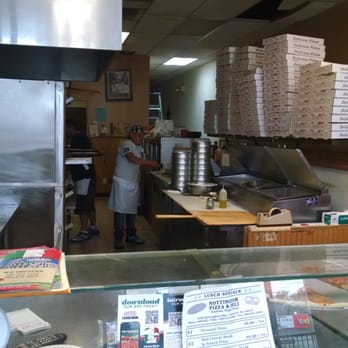 Nottingham Pizza And De - a man working in a restaurant - Pizza Near Me - Hmltn Twp, New Jersey Nottingham Pizza And De - a man working in a restaurant - Pizza Near Me - Hmltn Twp, New Jersey