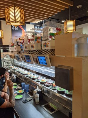 Kura Revolving Sushi Bar by null