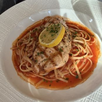 La Famiglia - Salmon special with marinara sauce (instead of a creamy pesto). - Italian Near Me - Reno, Nevada La Famiglia - Salmon special with marinara sauce (instead of a creamy pesto). - Italian Near Me - Reno, Nevada