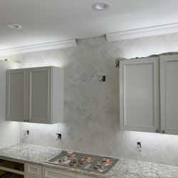 BB Marble & Tile - Herringbone pattern on backsplash.