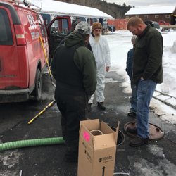 IBS Septic & Drain Service - I.B.S. Septic & Drain, Inc. inspecting the septic system.