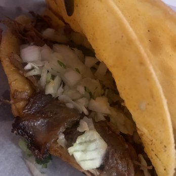 Birria - Bite - Taco de birria (chivo) with cilantro, repollo & cebolla - Mexican Near Me - Las Vegas, Nevada