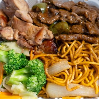 Poke Island Grill - Combo Plate #4 Two Proteins Two Sides: $13.59; $14.80 with tax. Shown with Bourbon Chicken, Pepper Beef, Broccoli, and Noodles. Mediocre. - Poke Near Me - Elmhurst, New York Poke Island Grill - Combo Plate #4 Two Proteins Two Sides: $13.59; $14.80 with tax. Shown with Bourbon Chicken, Pepper Beef, Broccoli, and Noodles. Mediocre. - Poke Near Me - Elmhurst, New York