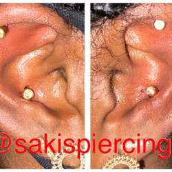 Saki’s Piercings - Flat, Mid-Helix, and Conch piercings.