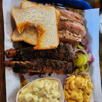 Uncle's BBQ  - Meat platter -- really thick cuts of brisket, ribs were fantastic. Couldn't help myself before taking a photo. - Barbeque Near Me - Tomball, Texas