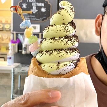 Snowtime - Matcha and taro swirled ice cream in a fish cone, filled with Nutella, topped with Oreo crumbles and mochi - Coffee & Tea Near Me - Chandler, Arizona Snowtime - Matcha and taro swirled ice cream in a fish cone, filled with Nutella, topped with Oreo crumbles and mochi - Coffee & Tea Near Me - Chandler, Arizona
