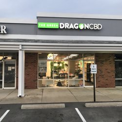 The Green Dragon CBD - We are located between a barber and seamstress. Look for our green sign!