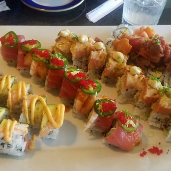Sushi Lola's - Deluxe Rolls. From left: Unbelievable Roll- Fire Roll- Desiree Roll & Dirty Old Man - Sushi Bars Near Me - Orlando, Florida
