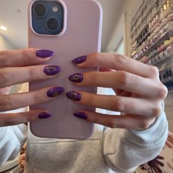 Hannah's Allure Salon & Spa - Purple-pink color changing almond shaped nails with moons, a star and sun
