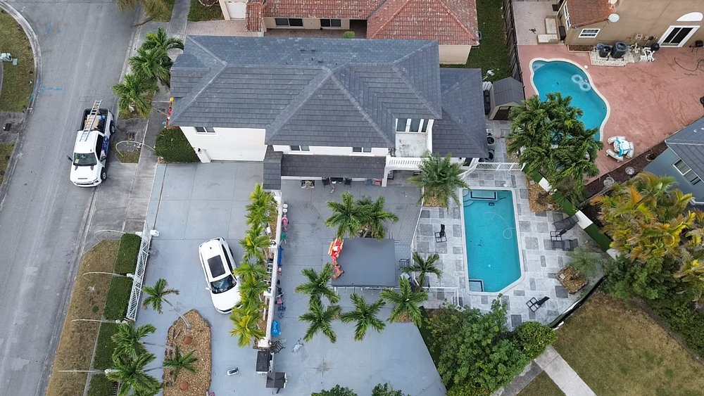 Slide of MC Roofing Service