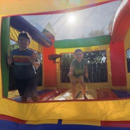 My kids enjoying the bounce house My kids enjoying the bounce house