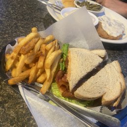 Bacon Lettuce & Tomato sandwich and French fries.