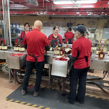 Maker's Mark Distillery - Hand dipping to get wax seal - Tours Near Me - Loretto, Kentucky Maker's Mark Distillery - Hand dipping to get wax seal - Tours Near Me - Loretto, Kentucky