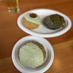 Umami Kushi - Chimichurri chicken, Jerk Chicken (back), Black Eyed Peas (back right)