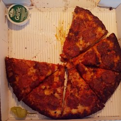 Papa Johns Pizza - Black burned pizza... not going back.