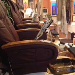 Pedicure stations with iPads. Pedicure stations with iPads.