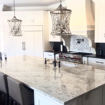 Georgia Stoneworks - We provided the two slabs used on the island. White granite is highly desirable and hard to find. Yes we have it in stock! - Countertop Installation Near Me