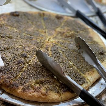Dimassi's Mediterranean Buffet - a pizza on a plate - Mediterranean Near Me - Irving, Texas Dimassi's Mediterranean Buffet - a pizza on a plate - Mediterranean Near Me - Irving, Texas