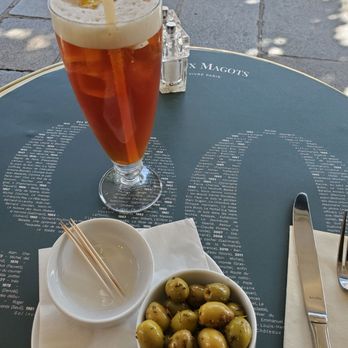 Les Deux Magots - Ice tea with olives while I wait - French Near Me - Paris, 75 Les Deux Magots - Ice tea with olives while I wait - French Near Me - Paris, 75