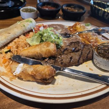Tierra Caliente Mexican Cuisine - Carne asada with enchilada combo. - New Mexican Cuisine Near Me - Pasadena, California Tierra Caliente Mexican Cuisine - Carne asada with enchilada combo. - New Mexican Cuisine Near Me - Pasadena, California