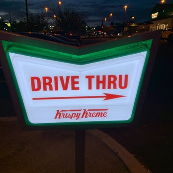 Krispy Kreme - Drive thru sign lit up at night - Donuts Near Me - San Diego, California Krispy Kreme - Drive thru sign lit up at night - Donuts Near Me - San Diego, California