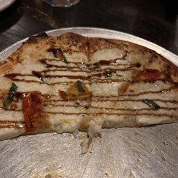 Supposed to be Caprese pizza. Was not close but still tasted ok. Supposed to be Caprese pizza. Was not close but still tasted ok.
