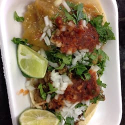 La Favorita Market - Chicarron taco and asada taco. One wedge of lime was completely dry.