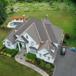 Lecla Home Improvements & Roofing - Asphalt Roof with Metal Accents