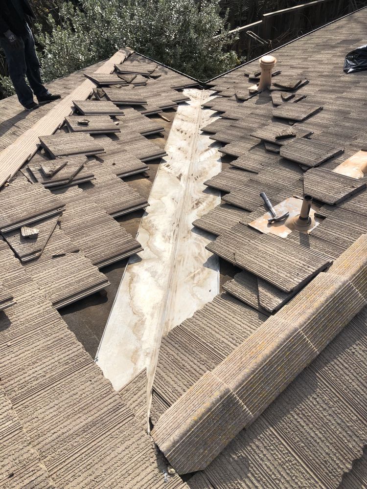 Slide of East Bay Roofing