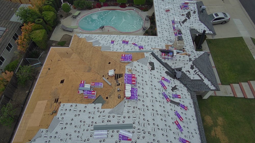 Slide of New Roofs Oc