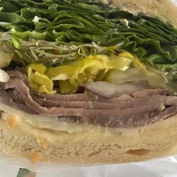 Holiday Market - Dutch crunch bread, roast beef, pepper jack cheese,onion, sprouts,cucumber, lettuce. Pepperchinis,jalapeño