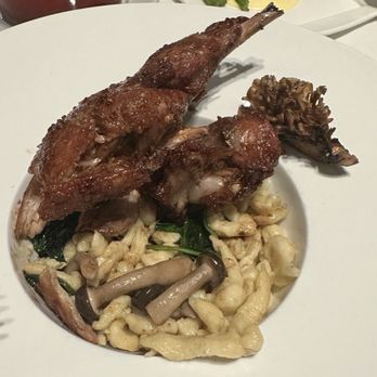 Restaurant R'evolution - Rabbit confit with Spätzle - Cajun/Creole Near Me - New Orleans, Louisiana Restaurant R'evolution - Rabbit confit with Spätzle - Cajun/Creole Near Me - New Orleans, Louisiana