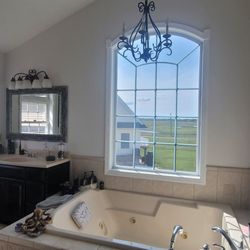 Sun Busters Window Tinting - Gorgeous tint on architectural windows in my master bath, on the sunniest brightest day! Ultra clear looking out.