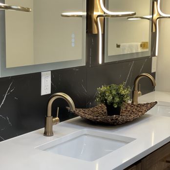 MG RENOVATION - a sink and mirror in a bathroom - General Contractors Near Me