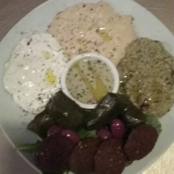 Garlic Lovers Corner - Mediterranean plate with falafel, dolmas, olives, tzatziki, hummus, and garlic sauce - Greek Near Me - North Greenbush, New York