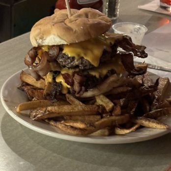 Squirrel Hill Cafe - Bacon double cheeseburger.  One pound of meat.  Good luck finishing it. - Pubs Near Me - Pittsburgh, Pennsylvania