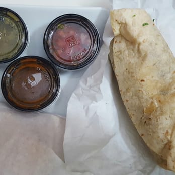 Spanglish Kitchen - Carnitas Burrito with chips and the three sauce (pico, verde, and spicy). - Mexican Near Me - Alhambra, California Spanglish Kitchen - Carnitas Burrito with chips and the three sauce (pico, verde, and spicy). - Mexican Near Me - Alhambra, California
