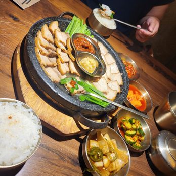 Jincook - Garlic Suyuk with an assortment of banchans - Korean Near Me - Yorba Linda, California Jincook - Garlic Suyuk with an assortment of banchans - Korean Near Me - Yorba Linda, California