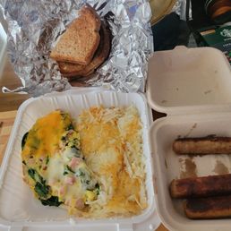 Buttered Wheat toast. Spinach, ham, cheese omelet. Hash browns. Side of sausage Buttered Wheat toast. Spinach, ham, cheese omelet. Hash browns. Side of sausage