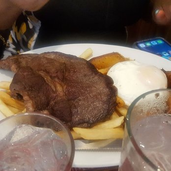 Mi Perú Peruvian Cuisine - Steak with eggs and fries - Peruvian Near Me - Durham, North Carolina Mi Perú Peruvian Cuisine - Steak with eggs and fries - Peruvian Near Me - Durham, North Carolina
