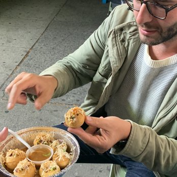 Tong - A friend experiencing their fuchka - Bangladeshi Near Me - Jackson Heights, New York Tong - A friend experiencing their fuchka - Bangladeshi Near Me - Jackson Heights, New York