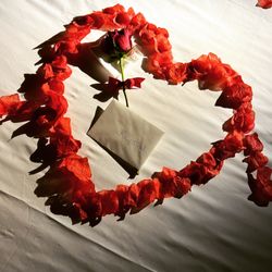Always a Concierge - A heart of Rose Petals on the bed says it all !