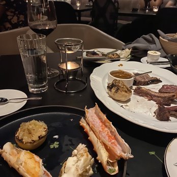 BLVD Steakhouse - Grilled king crab and drawn butter - New American Near Me - Chicago, Illinois