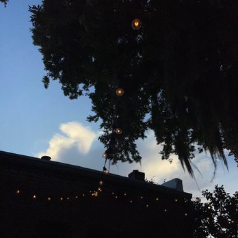 Old Bull Tavern - Lights above the outdoor seating area - New American Near Me - Beaufort, South Carolina